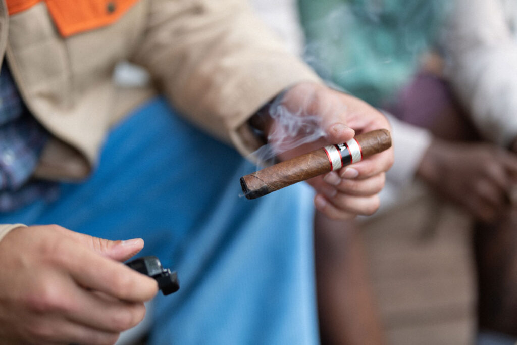 Lighting cigar with torch